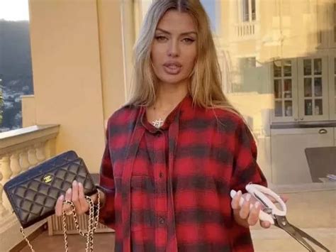 russian influencer cutting chanel bag|A Russian influencer posed with what looked like a Chanel bag 5 .